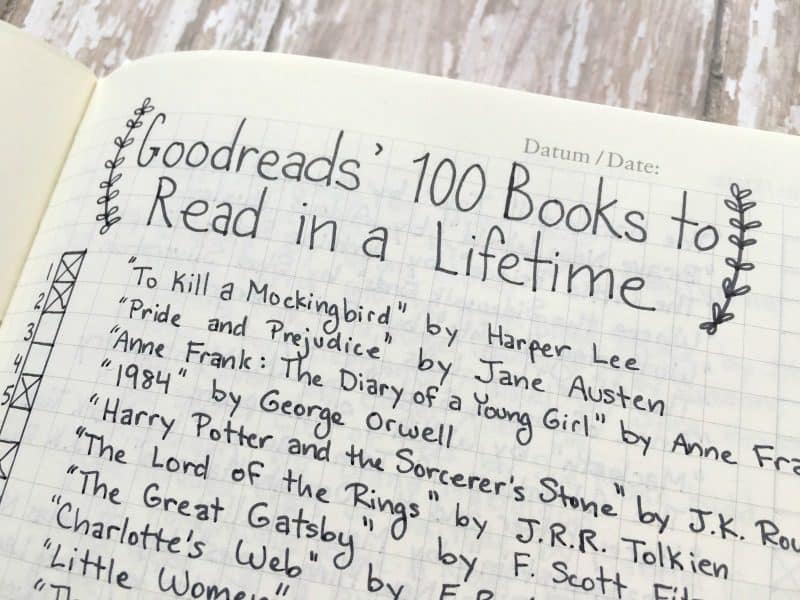A detail of a book journal page showing books on the GoodReads 100 Books to Read in a Lifetime