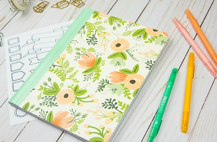 DIY journal from a boring composition notebook! This would make a cute Bullet Journal.