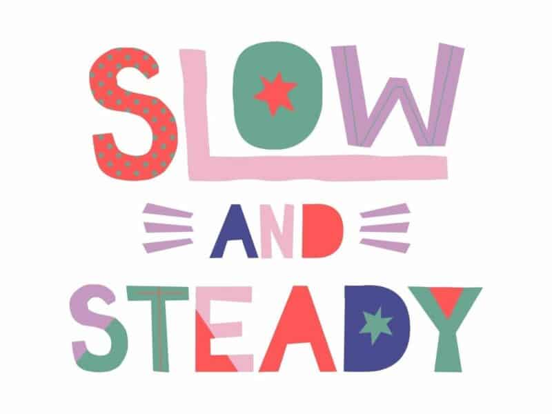 Colorful and whimsical text spells out "Slow and Steady" as a motivational message