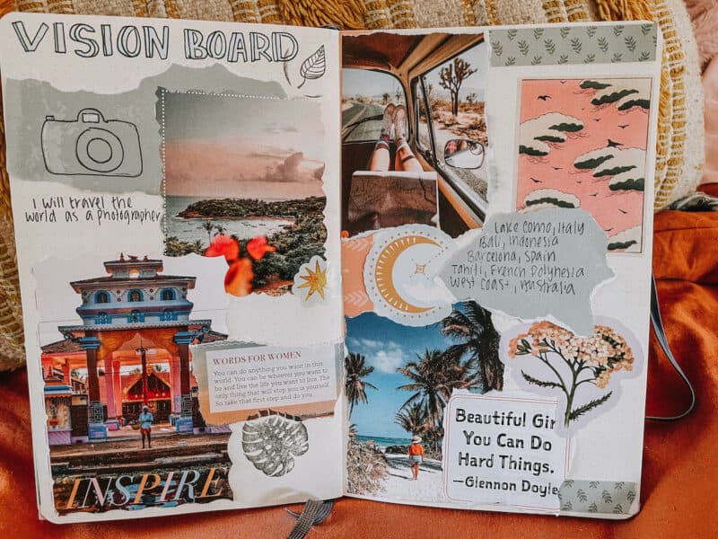 A beautiful vision board journal spread showing travel, career, and inspirational goals