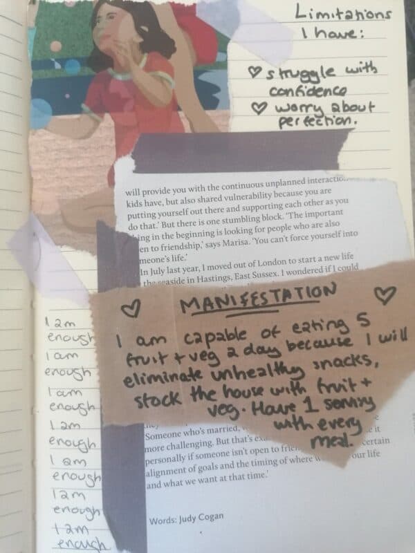 Image of a bullet journal with inspiring manifesting message 