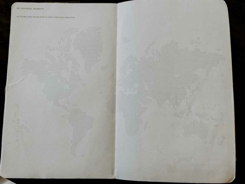 Dotten map pages in a Moleskine classic notebook